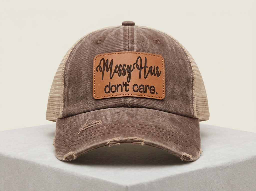 Distressed Brown Trucker Hat with 'Messy Hair Don't Care' Leather Patch