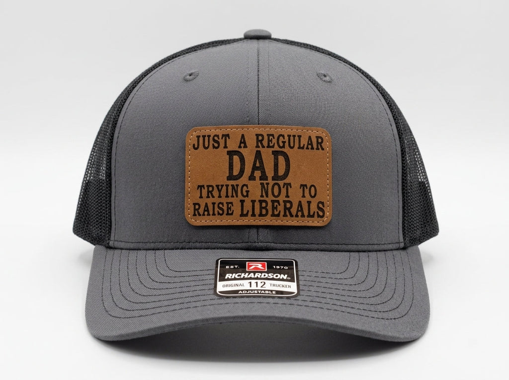 Just A Regular Dad Trying Not To Raise Liberals Richardson 112 Trucker Hat