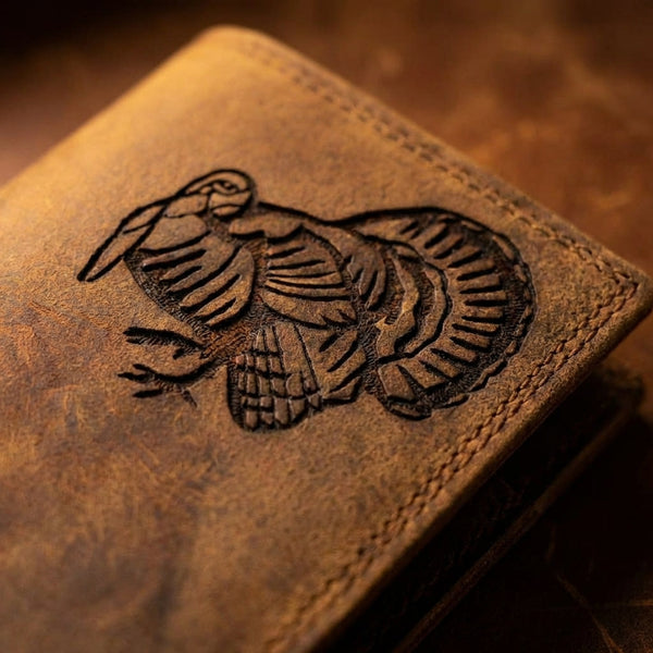 Brown distressed leather roper wallet featuring a detailed embossed wild turkey design.